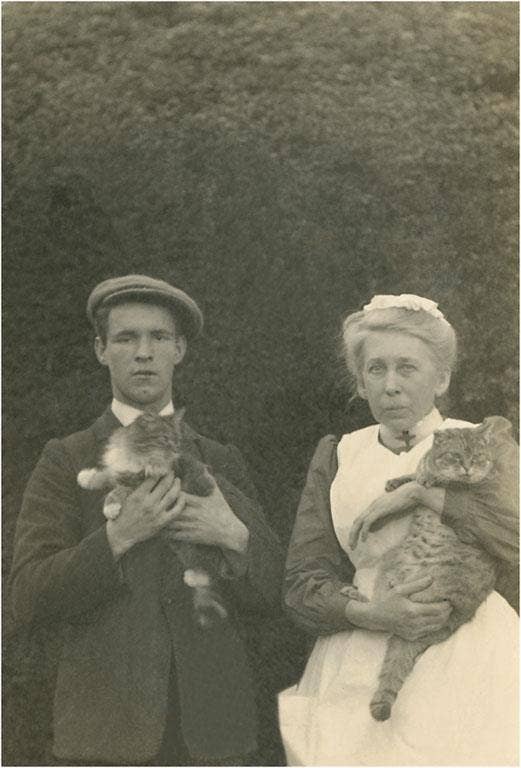 Holding Cats Magnet