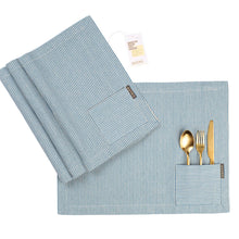 Load image into Gallery viewer, Blue striped placemat with a pocket and matching napkin on a white background
